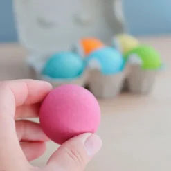 Bolas de madera colores pastel en huevera (6) - Grimm's