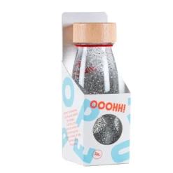 Botella sensorial flotante transparente y plateado Float Bottle - Petit Boum
