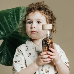 Botella sensorial sonido virutas Monkey Sound Bottle - Petit Boum