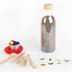 Botella sensorial Touch Bottle Wow con accesorios - Petit Boum