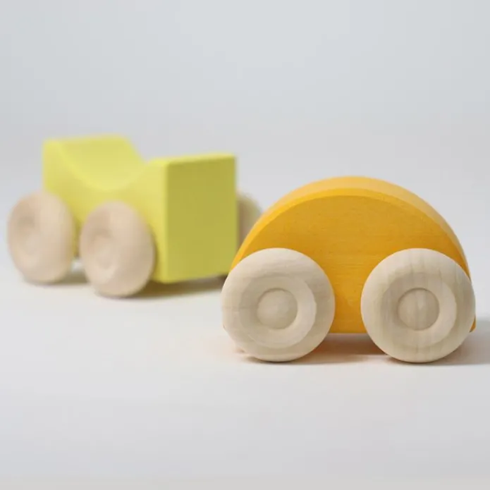Coches de madera apilables amarillos (2) - Grimm's