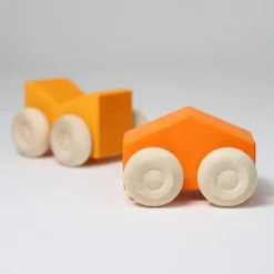 Coches de madera apilables naranjas (2) - Grimm's