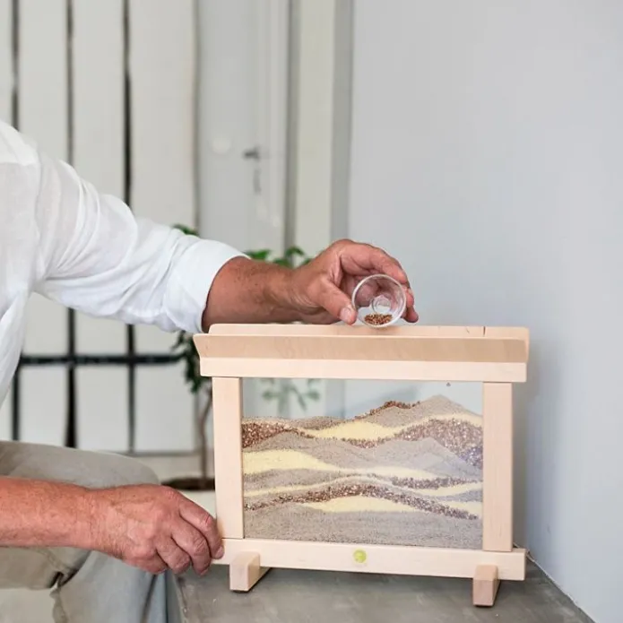 Marco creativo de madera con arena - JonEly
