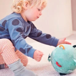 Pelota sensorial con sonidos Joe 17 cm - Lilliputiens