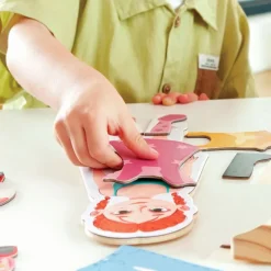 Puzles magnéticos con soporte para vestir a los niños - Hape